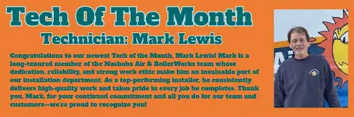 A man stands next to a wall with a "Tech of the Month" banner announcing Mark Lewis as Technician of the Month, along with a description of his achievements.
